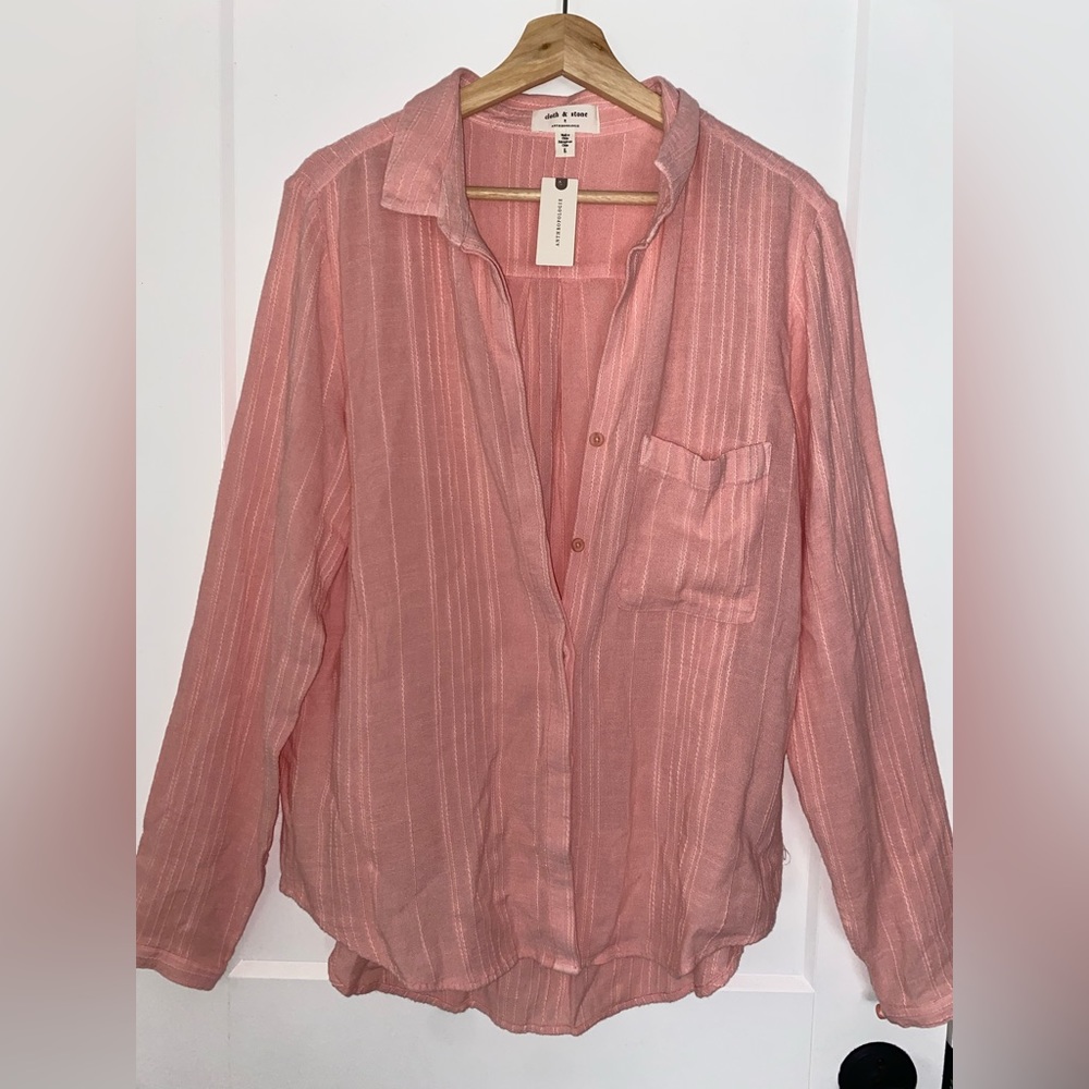 Pink button up, long sleeve, comfortable and includes thumb holes